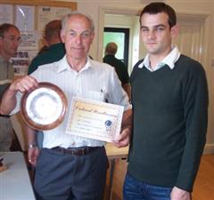 Daniel presents the certificate to Syd Weatherbey